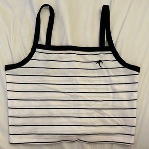 white with black stripes cropped tank top, palm tree on left side